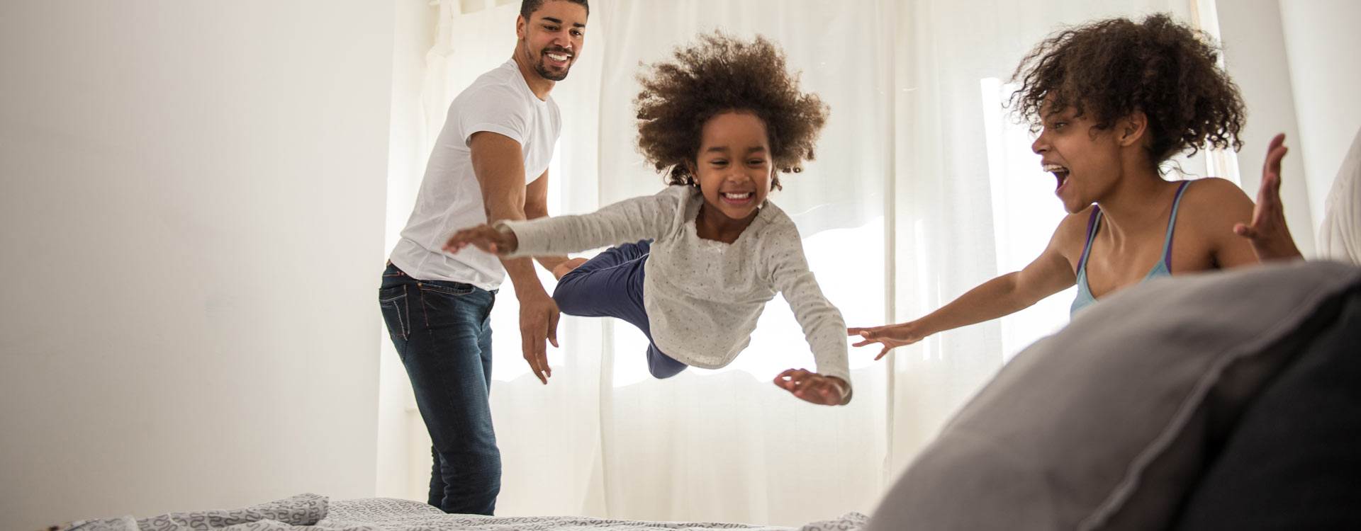 Father and daughters enjoying comfortable home